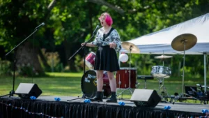 A young singer performs on a stage during Downingtown Has Talent in 2024.
